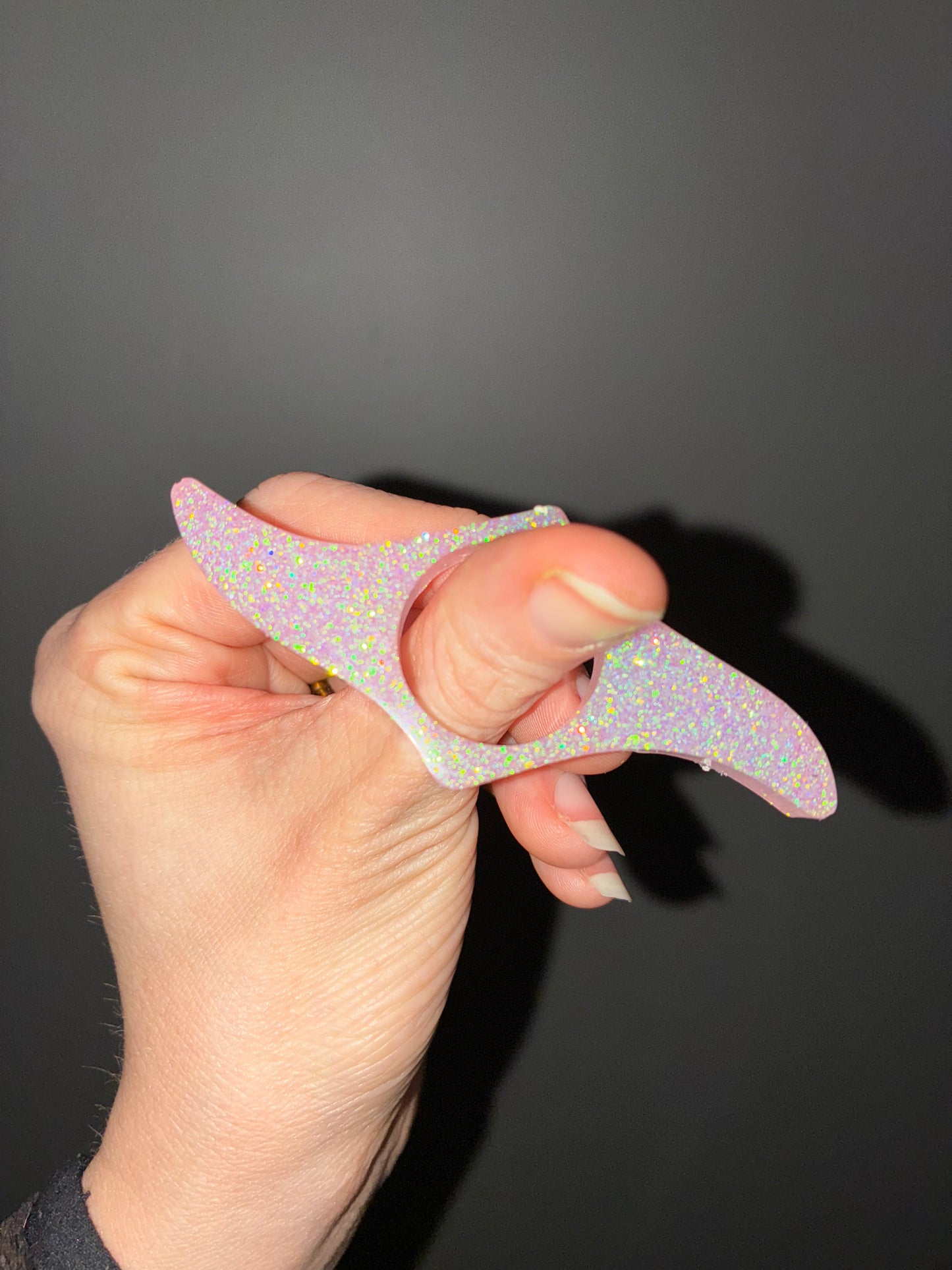 Thumb book page holder